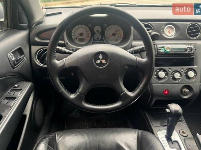 Серый Мицубиси Аутлендер, объемом двигателя 2.4 л и пробегом 245 тыс. км за 6790 $, фото 13 на Automoto.ua