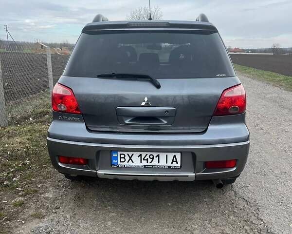 Сірий Міцубісі Аутлендер, об'ємом двигуна 2 л та пробігом 280 тис. км за 7200 $, фото 4 на Automoto.ua