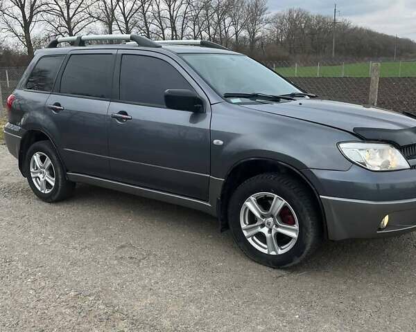 Сірий Міцубісі Аутлендер, об'ємом двигуна 2 л та пробігом 280 тис. км за 7200 $, фото 6 на Automoto.ua