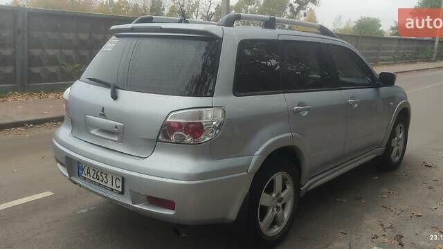 Сірий Міцубісі Аутлендер, об'ємом двигуна 2.38 л та пробігом 200 тис. км за 6550 $, фото 3 на Automoto.ua