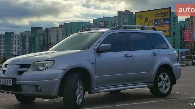 Сірий Міцубісі Аутлендер, об'ємом двигуна 2.4 л та пробігом 170 тис. км за 6400 $, фото 6 на Automoto.ua