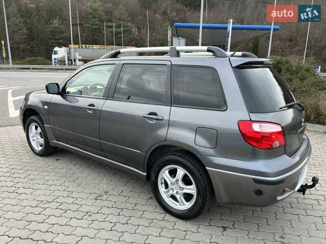Сірий Міцубісі Аутлендер, об'ємом двигуна 2 л та пробігом 192 тис. км за 6400 $, фото 29 на Automoto.ua