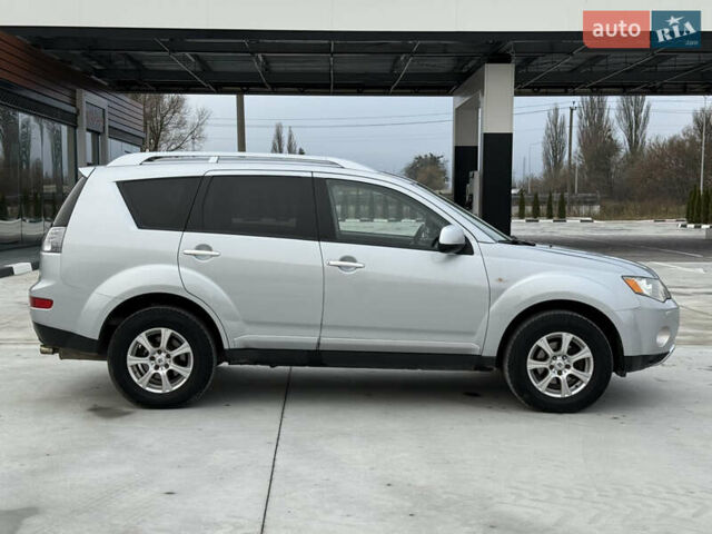 Серый Мицубиси Аутлендер, объемом двигателя 2 л и пробегом 299 тыс. км за 7750 $, фото 5 на Automoto.ua