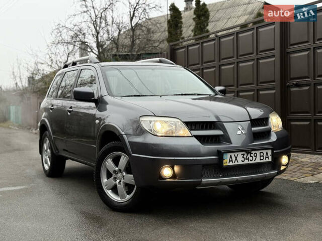 Серый Мицубиси Аутлендер, объемом двигателя 2.4 л и пробегом 240 тыс. км за 6900 $, фото 38 на Automoto.ua