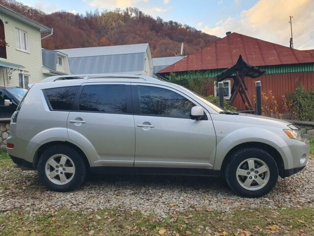 Серый Мицубиси Аутлендер, объемом двигателя 2 л и пробегом 320 тыс. км за 7500 $, фото 12 на Automoto.ua