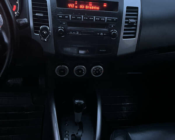 Серый Мицубиси Аутлендер, объемом двигателя 2.4 л и пробегом 236 тыс. км за 7600 $, фото 40 на Automoto.ua