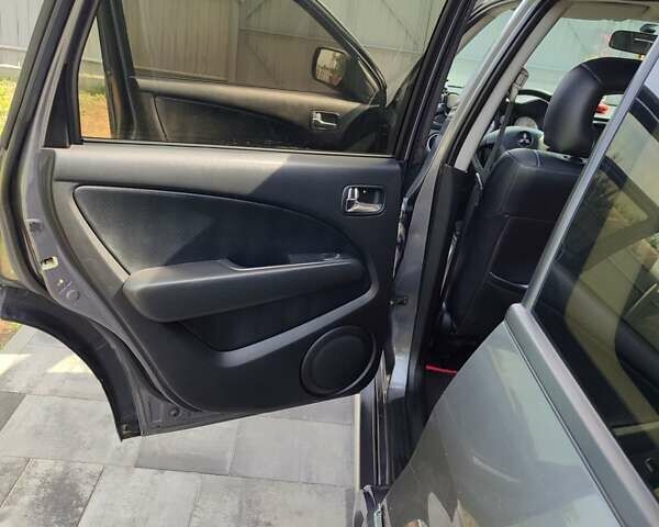 Серый Мицубиси Аутлендер, объемом двигателя 2.4 л и пробегом 23 тыс. км за 8300 $, фото 4 на Automoto.ua