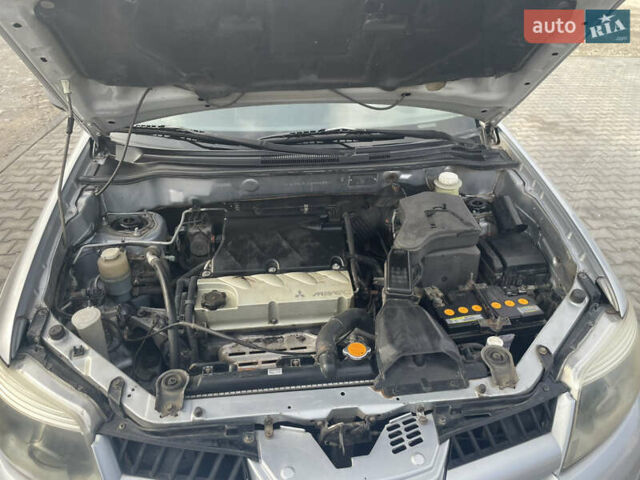 Сірий Міцубісі Аутлендер, об'ємом двигуна 2.4 л та пробігом 166 тис. км за 6700 $, фото 16 на Automoto.ua