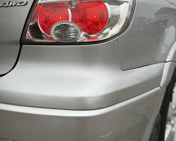 Серый Мицубиси Аутлендер, объемом двигателя 2.38 л и пробегом 238 тыс. км за 7450 $, фото 19 на Automoto.ua