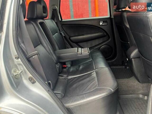 Сірий Міцубісі Аутлендер, об'ємом двигуна 2.38 л та пробігом 245 тис. км за 5990 $, фото 10 на Automoto.ua