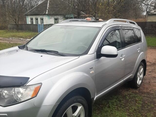Серый Мицубиси Аутлендер, объемом двигателя 3 л и пробегом 183 тыс. км за 9200 $, фото 3 на Automoto.ua