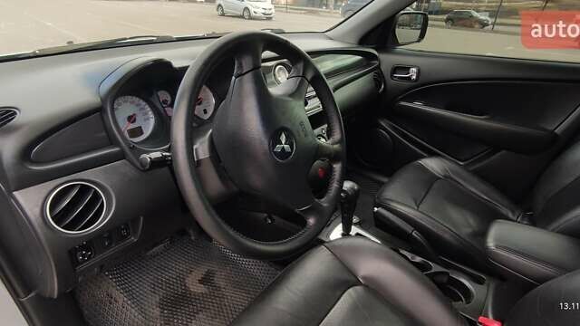 Сірий Міцубісі Аутлендер, об'ємом двигуна 2.4 л та пробігом 170 тис. км за 6400 $, фото 22 на Automoto.ua