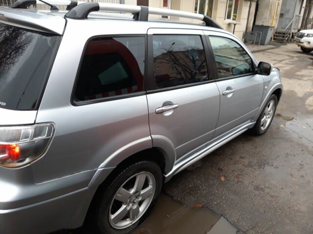 Сірий Міцубісі Аутлендер, об'ємом двигуна 2.4 л та пробігом 190 тис. км за 6000 $, фото 2 на Automoto.ua