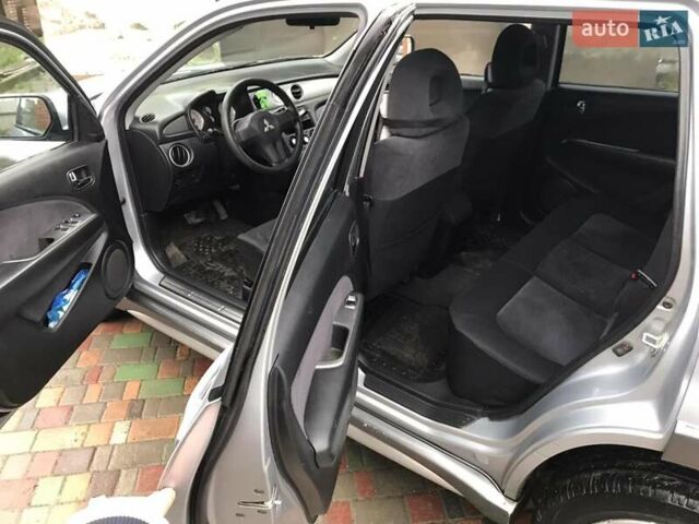 Сірий Міцубісі Аутлендер, об'ємом двигуна 2.4 л та пробігом 167 тис. км за 6400 $, фото 6 на Automoto.ua