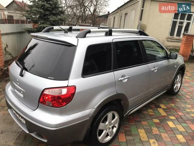 Сірий Міцубісі Аутлендер, об'ємом двигуна 2.4 л та пробігом 167 тис. км за 6400 $, фото 10 на Automoto.ua