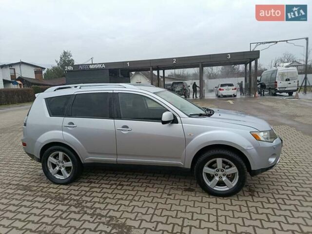 Серый Мицубиси Аутлендер, объемом двигателя 2 л и пробегом 332 тыс. км за 7650 $, фото 8 на Automoto.ua