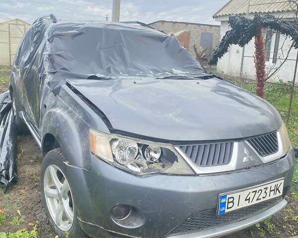 Серый Мицубиси Аутлендер, объемом двигателя 1.97 л и пробегом 250 тыс. км за 4000 $, фото 3 на Automoto.ua