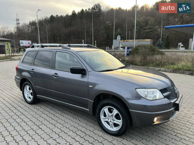 Сірий Міцубісі Аутлендер, об'ємом двигуна 2 л та пробігом 192 тис. км за 6400 $, фото 28 на Automoto.ua