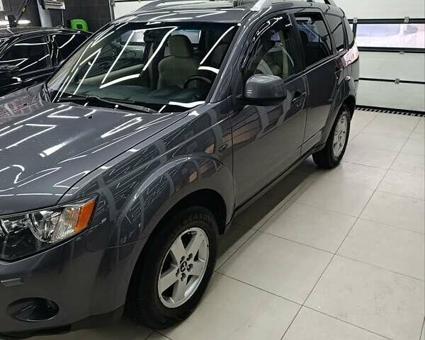 Сірий Міцубісі Аутлендер, об'ємом двигуна 2.36 л та пробігом 214 тис. км за 8500 $, фото 2 на Automoto.ua