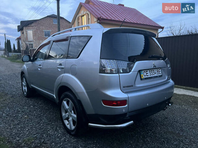 Серый Мицубиси Аутлендер, объемом двигателя 2.4 л и пробегом 236 тыс. км за 7600 $, фото 11 на Automoto.ua