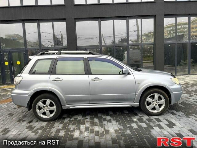 Серый Мицубиси Аутлендер, объемом двигателя 2.4 л и пробегом 280 тыс. км за 5800 $, фото 5 на Automoto.ua