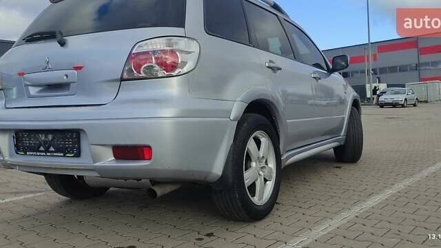 Сірий Міцубісі Аутлендер, об'ємом двигуна 2.4 л та пробігом 170 тис. км за 6400 $, фото 11 на Automoto.ua