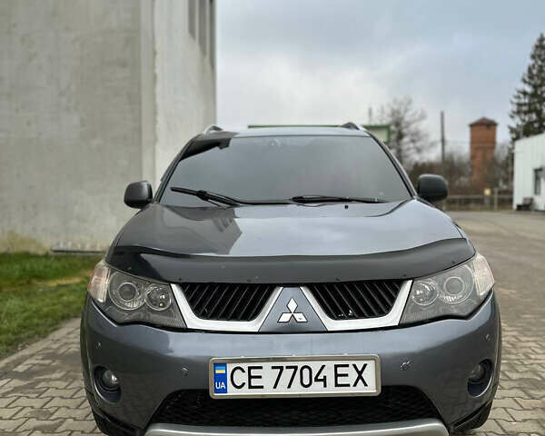 Сірий Міцубісі Аутлендер, об'ємом двигуна 2.36 л та пробігом 380 тис. км за 10000 $, фото 13 на Automoto.ua