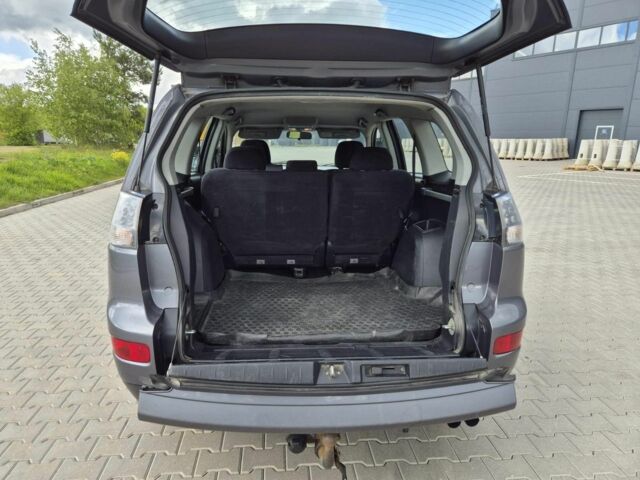 Серый Мицубиси Аутлендер, объемом двигателя 2 л и пробегом 300 тыс. км за 4500 $, фото 16 на Automoto.ua