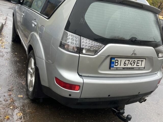 Серый Мицубиси Аутлендер, объемом двигателя 0 л и пробегом 319 тыс. км за 6900 $, фото 3 на Automoto.ua