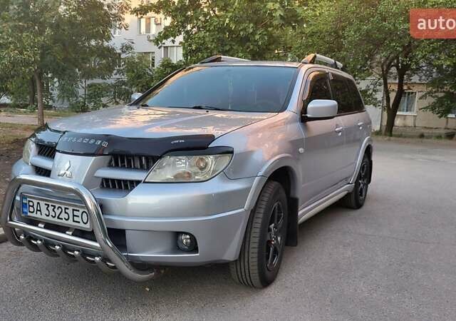 Сірий Міцубісі Аутлендер, об'ємом двигуна 2.4 л та пробігом 260 тис. км за 7300 $, фото 3 на Automoto.ua