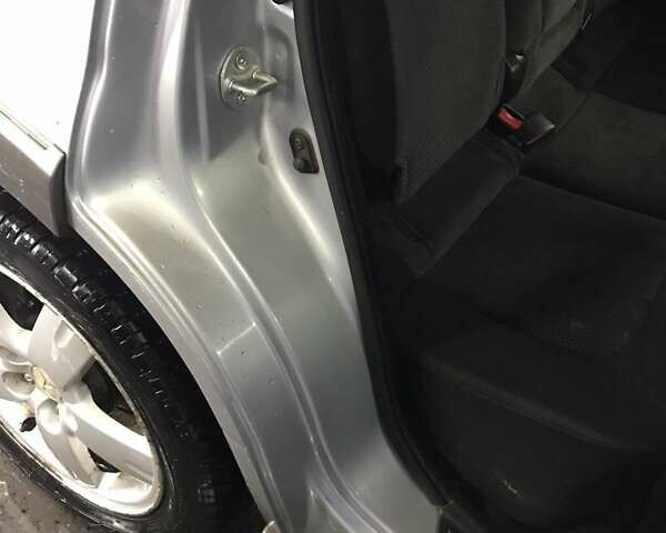 Сірий Міцубісі Аутлендер, об'ємом двигуна 2.4 л та пробігом 167 тис. км за 6400 $, фото 13 на Automoto.ua