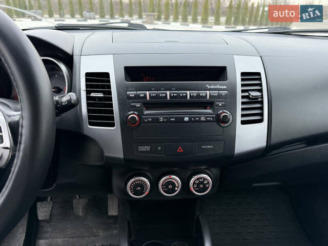 Серый Мицубиси Аутлендер, объемом двигателя 2 л и пробегом 299 тыс. км за 7750 $, фото 22 на Automoto.ua