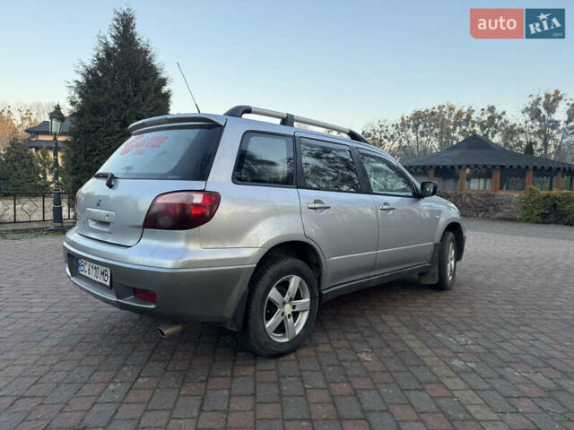Серый Мицубиси Аутлендер, объемом двигателя 2 л и пробегом 415 тыс. км за 4699 $, фото 3 на Automoto.ua