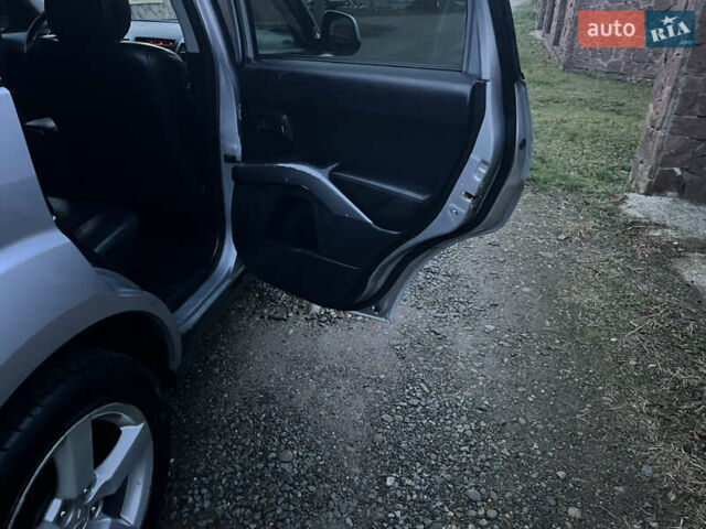 Серый Мицубиси Аутлендер, объемом двигателя 2.4 л и пробегом 236 тыс. км за 7600 $, фото 22 на Automoto.ua