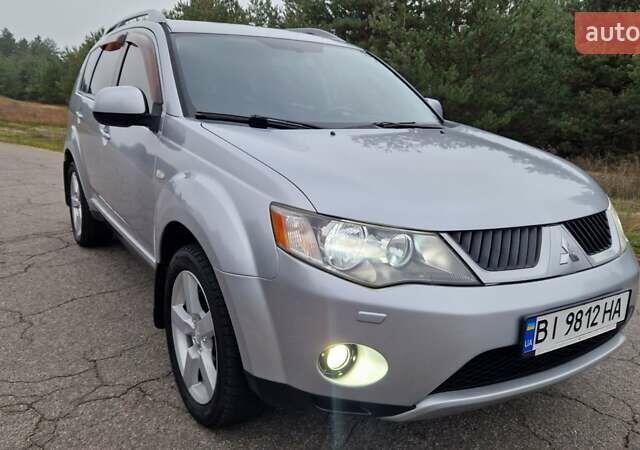 Серый Мицубиси Аутлендер, объемом двигателя 3 л и пробегом 197 тыс. км за 9500 $, фото 12 на Automoto.ua