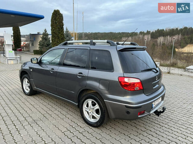 Серый Мицубиси Аутлендер, объемом двигателя 2 л и пробегом 196 тыс. км за 6450 $, фото 30 на Automoto.ua