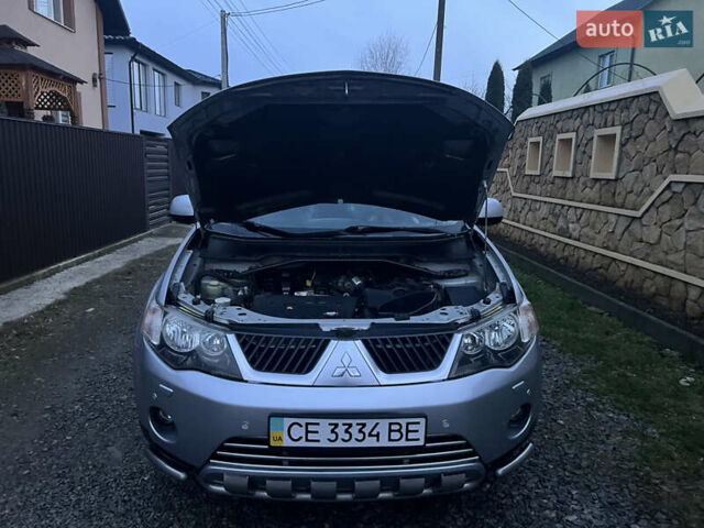 Серый Мицубиси Аутлендер, объемом двигателя 2.4 л и пробегом 236 тыс. км за 7600 $, фото 42 на Automoto.ua