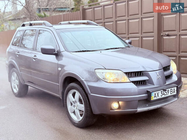 Серый Мицубиси Аутлендер, объемом двигателя 2.4 л и пробегом 240 тыс. км за 6900 $, фото 55 на Automoto.ua