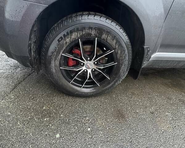 Серый Мицубиси Аутлендер, объемом двигателя 2 л и пробегом 260 тыс. км за 8400 $, фото 7 на Automoto.ua