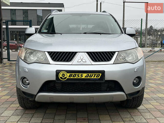 Серый Мицубиси Аутлендер, объемом двигателя 1.97 л и пробегом 310 тыс. км за 7600 $, фото 1 на Automoto.ua