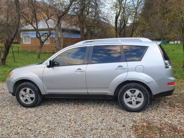 Серый Мицубиси Аутлендер, объемом двигателя 2 л и пробегом 320 тыс. км за 7500 $, фото 5 на Automoto.ua