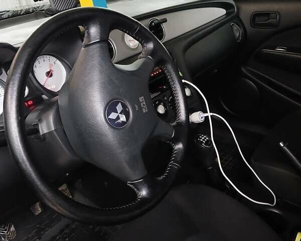 Сірий Міцубісі Аутлендер, об'ємом двигуна 2 л та пробігом 191 тис. км за 6500 $, фото 11 на Automoto.ua