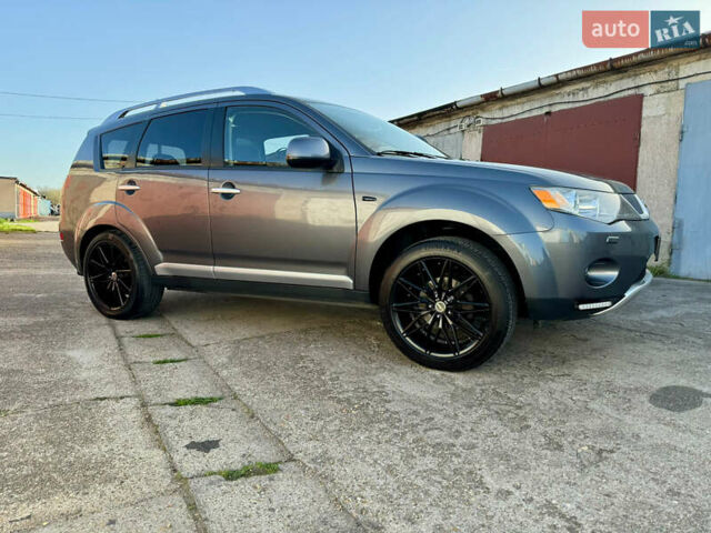 Серый Мицубиси Аутлендер, объемом двигателя 1.97 л и пробегом 260 тыс. км за 10900 $, фото 5 на Automoto.ua