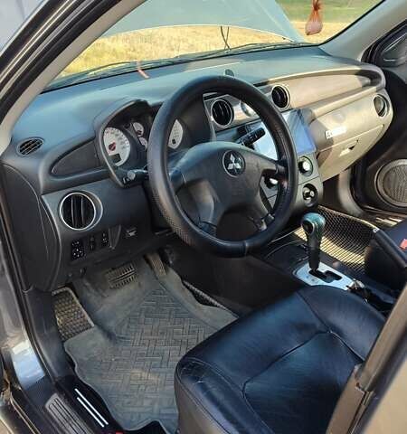 Серый Мицубиси Аутлендер, объемом двигателя 2.38 л и пробегом 189 тыс. км за 7600 $, фото 6 на Automoto.ua