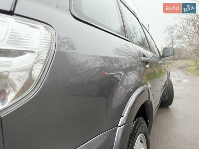 Серый Мицубиси Аутлендер, объемом двигателя 2.4 л и пробегом 240 тыс. км за 6900 $, фото 21 на Automoto.ua