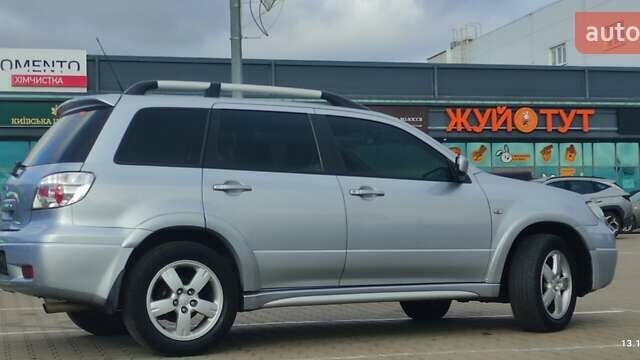 Сірий Міцубісі Аутлендер, об'ємом двигуна 2.4 л та пробігом 170 тис. км за 6400 $, фото 2 на Automoto.ua