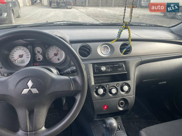 Сірий Міцубісі Аутлендер, об'ємом двигуна 2.4 л та пробігом 166 тис. км за 6700 $, фото 13 на Automoto.ua