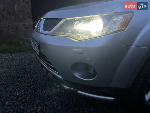 Серый Мицубиси Аутлендер, объемом двигателя 2.4 л и пробегом 236 тыс. км за 7600 $, фото 55 на Automoto.ua