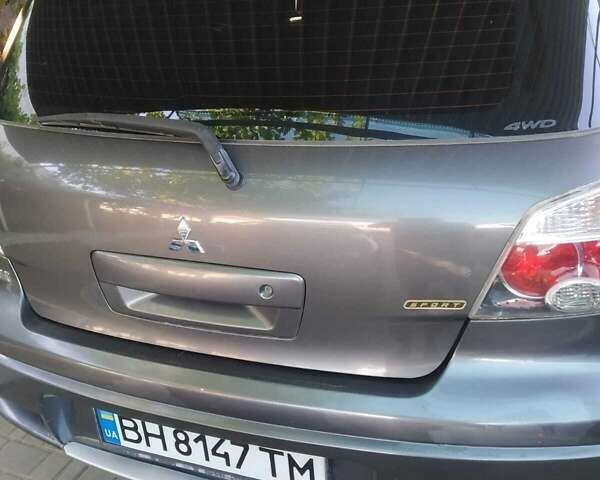 Серый Мицубиси Аутлендер, объемом двигателя 2.38 л и пробегом 189 тыс. км за 7800 $, фото 17 на Automoto.ua