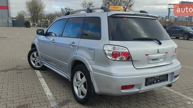 Сірий Міцубісі Аутлендер, об'ємом двигуна 2.4 л та пробігом 170 тис. км за 6400 $, фото 14 на Automoto.ua